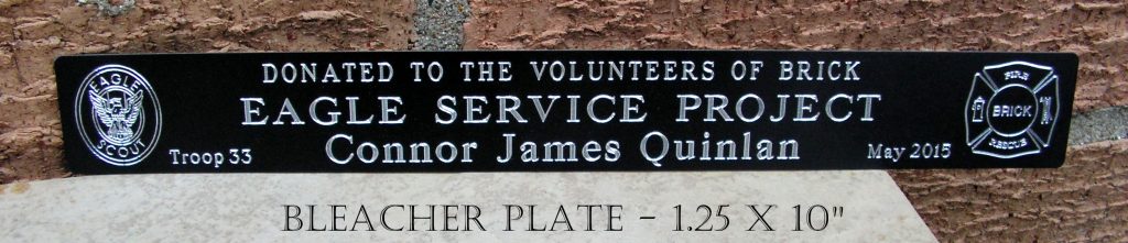 Engraved plate for marking bleachers, Eagle scout project, Black anodized alum.