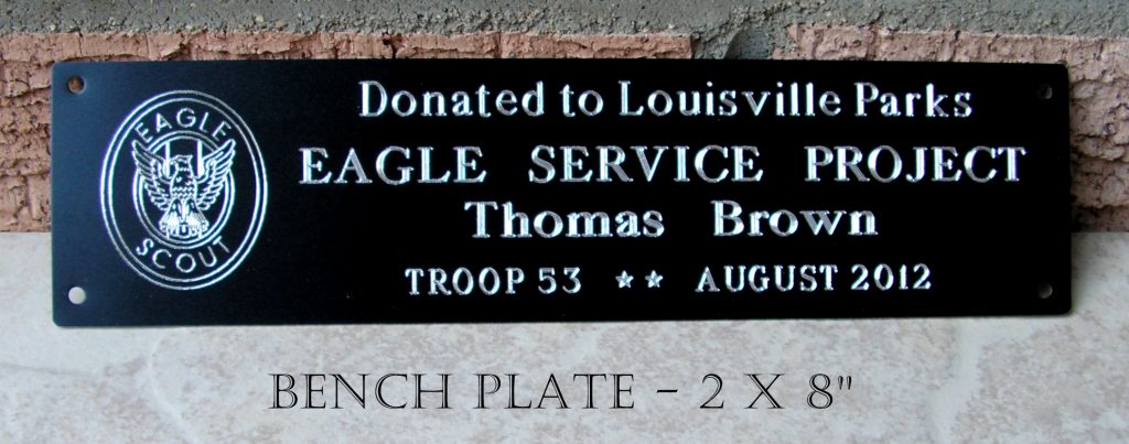 Outdoor bench plate, Eagle scout project, 2x8", screw mount, custom engraved, black anodized alum.