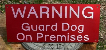 Custom engraved warning sign, red anodized alum.