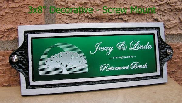 Decorative 3x8" screw mount plaque, Black trim / Green anodized insert